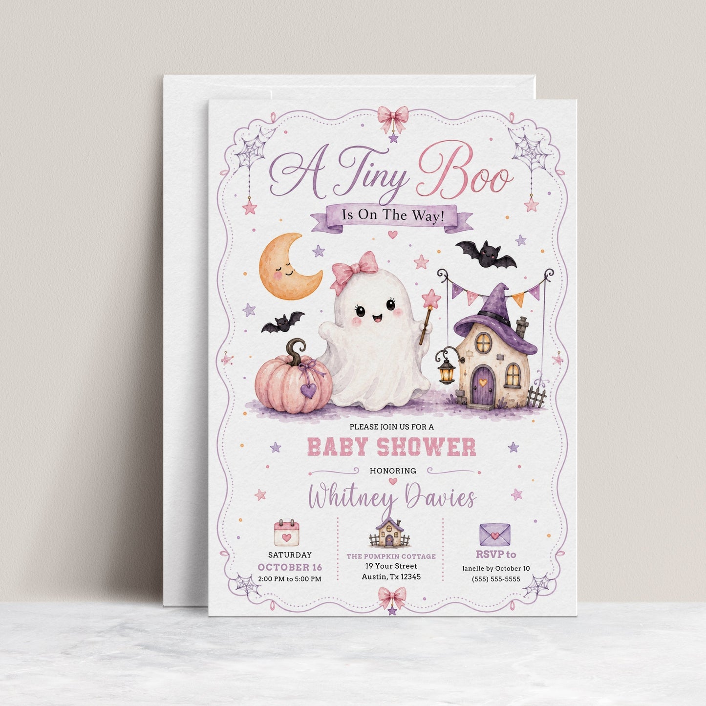Halloween girl baby shower invitation with cute ghost, pink pumpkin, bats, crescent moon, haunted house, spiderwebs, stars, and pastel Halloween baby shower details