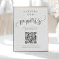 Minimalist black and white wedding photo sharing QR code sign template with calligraphy script and scan to upload instructions, editable in Canva