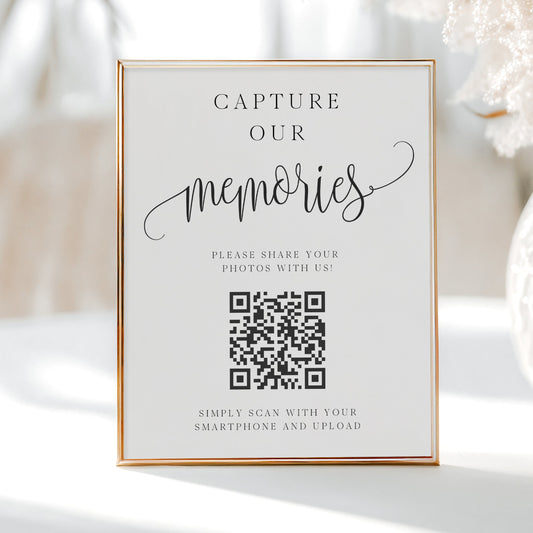 Minimalist black and white wedding photo sharing QR code sign template with calligraphy script and scan to upload instructions, editable in Canva