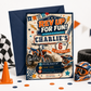 A customized motocross birthday invitation card for a boys birthday, displayed with a navy blue envelope. The card features a retro-style design with orange, blue, and cream colors, complete with illustrations of a dirt bike, a helmet, goggles, and racing elements.