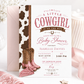 Little cowgirl baby shower invitation featuring pink cowboy boots, a pink bandana, brown cow-print border, horseshoes and western details.
