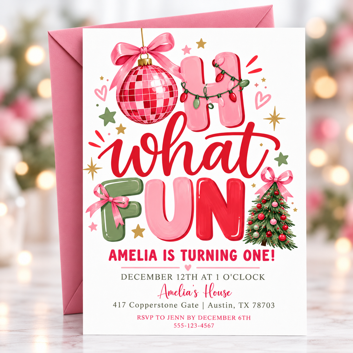 Christmas 1st birthday invitation with pink, red, and sage Oh What Fun lettering, a pink disco ornament, ribbon bows, Christmas lights, and a decorated tree
