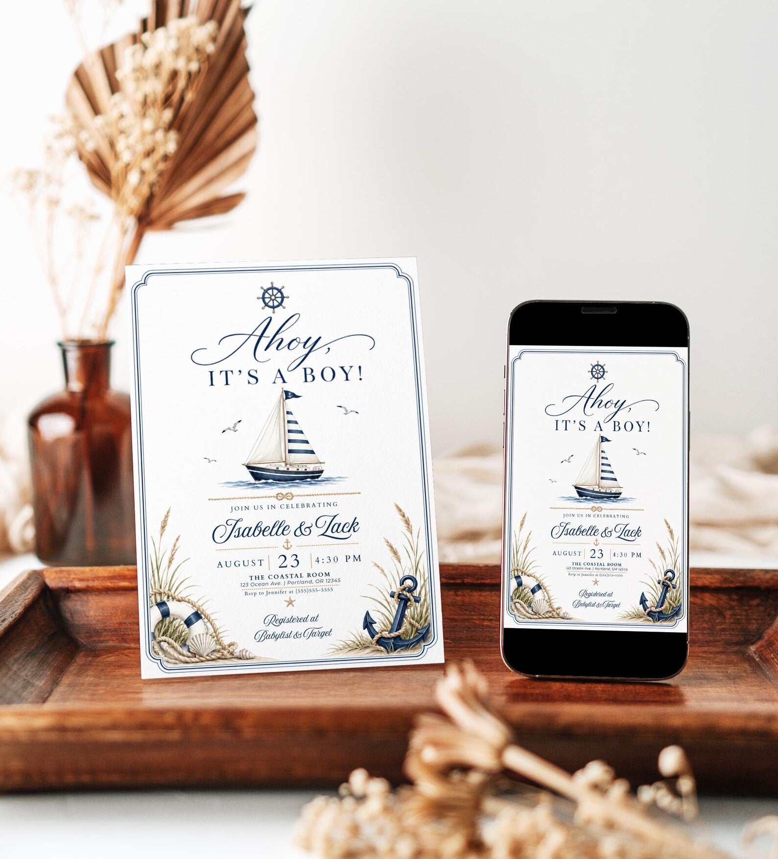 Nautical boy baby shower invitation with a sailboat, anchor, and life ring in navy and cream