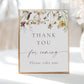 Wildflower thank you for coming baby shower favour sign template with watercolor meadow flowers in yellow, purple, and cream, editable in Canva